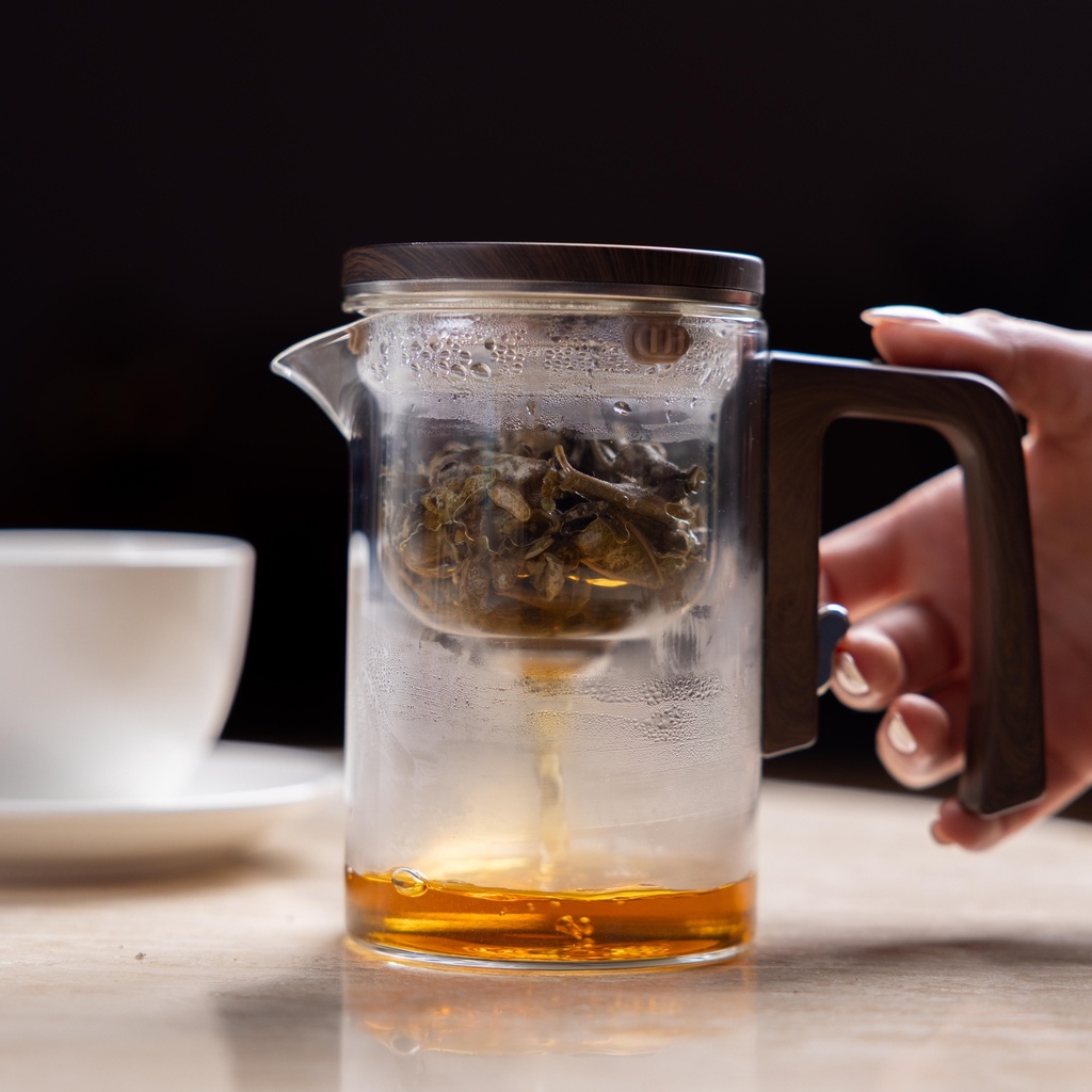 A glass cup for hot drinks